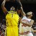 Michigan freshman Glenn Robinson III shoots the ball around Indiana freshman Jeremy Hollowell during the first half at Assembly Hall on Saturday, Feb. 2 in Bloomington, Ind. Melanie Maxwell I AnnArbor.com